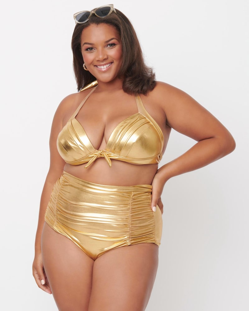 Front of a model wearing a size 1X Unique Vintage Gold Monroe Halter Swim Top in Metallic by Unique Vintage. | dia_product_style_image_id:289218